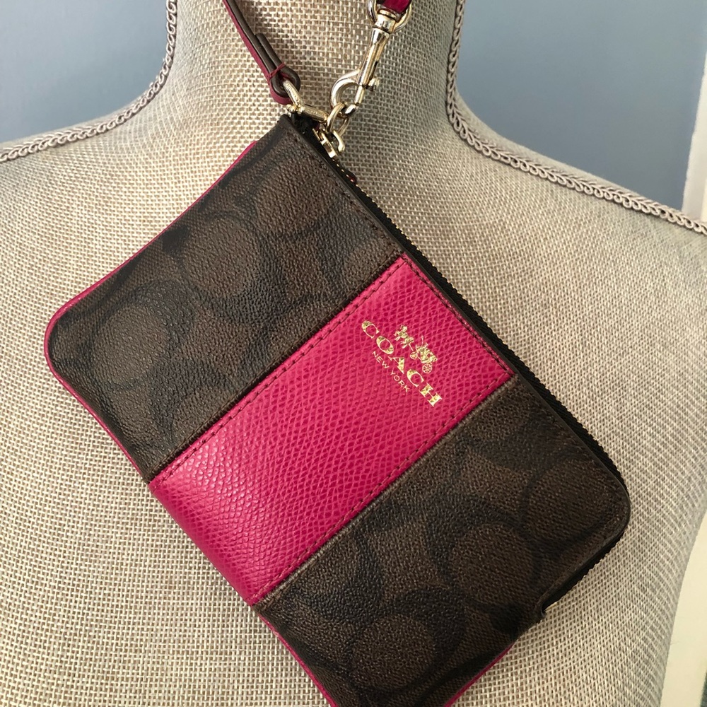 Coach wristlet, signature brown with vintage Mauve.